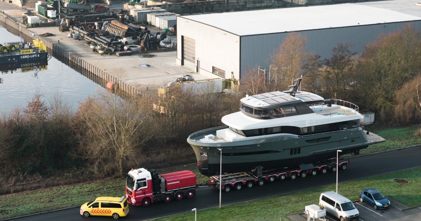 Steeler Ocean Explorer 85 motor yacht Moss on trolley on way to launch 