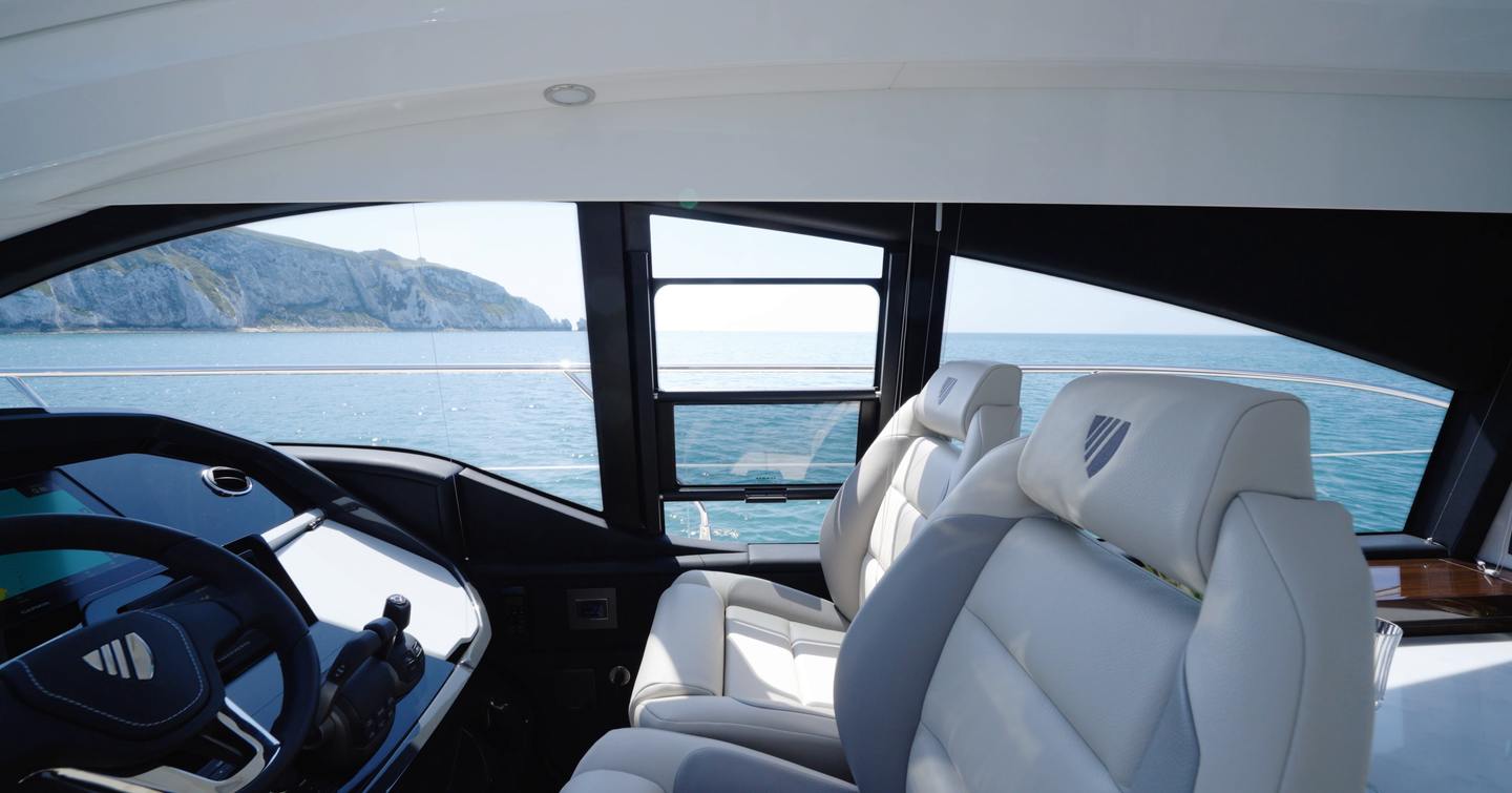 Twin helm seats and panoramic side glazing aboard the Fairline Targa 47 GT