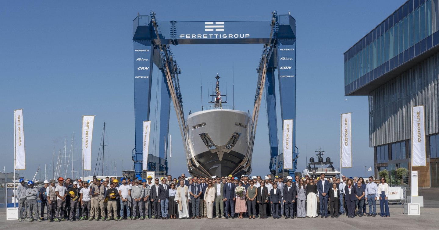 Custom Line team in front of Custom Line Saetta 128 Superyacht at launch
