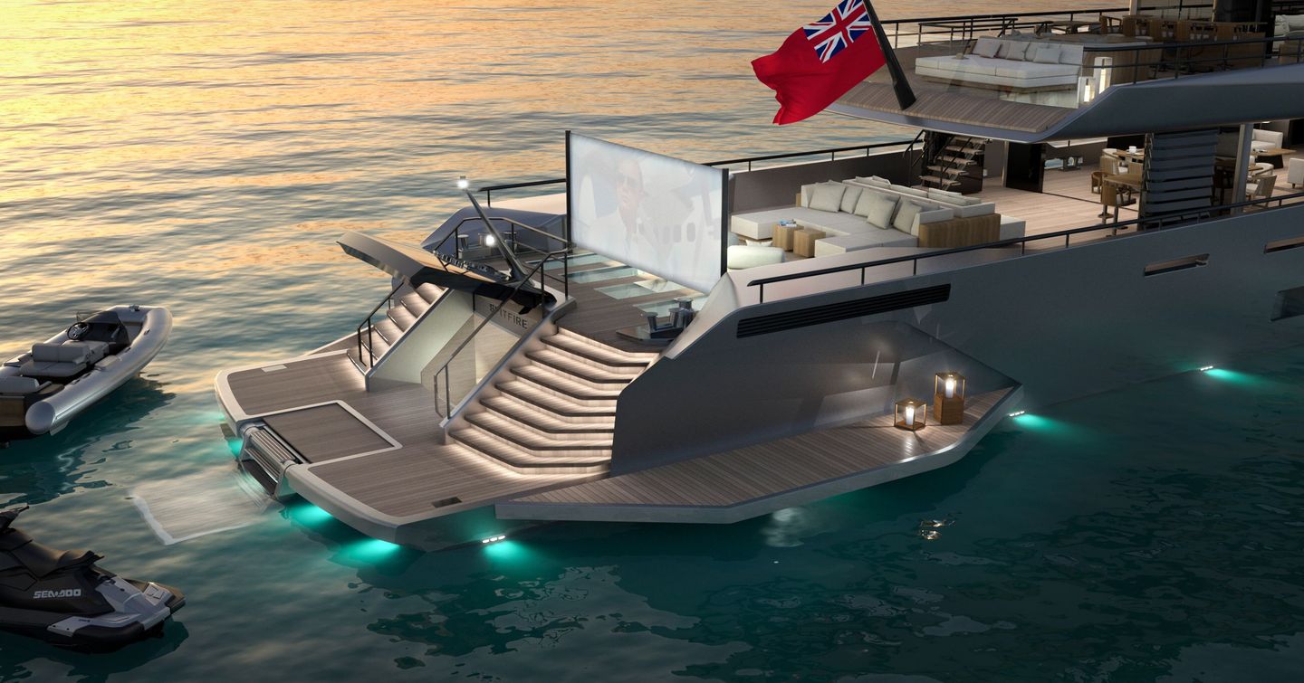 Aft deck of motor yacht Spitfire with projector screen and jetskis 