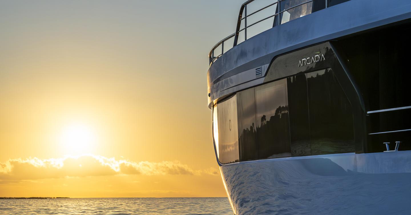  Arcadia A80 motor yacht at sea with sunrise 
