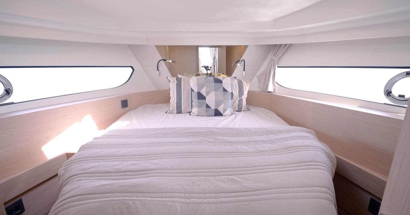 Beneteau Swift Trawler 37 Fly owner's cabin with island double berth and hull windows