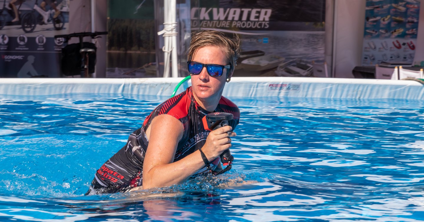 Female watertoys demonstrator in pool at FLIBS