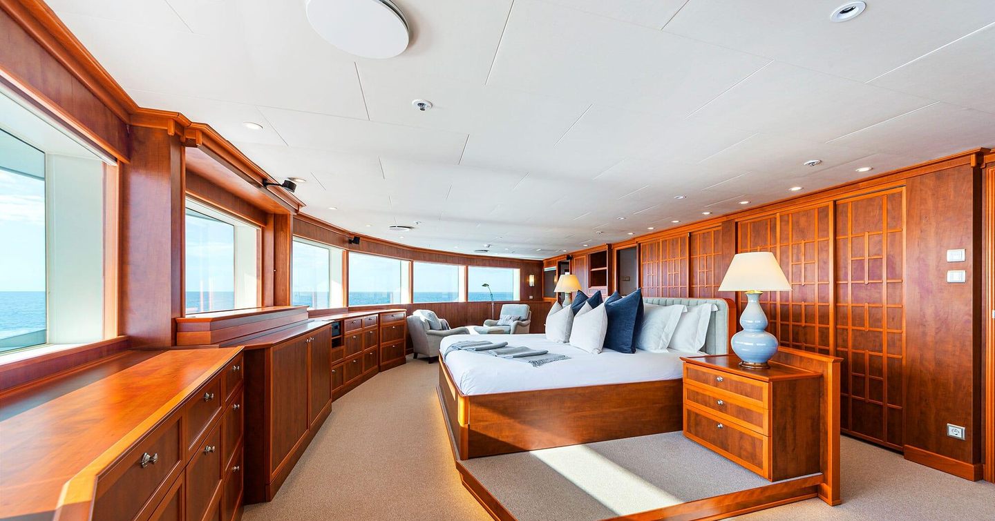 Nurja master cabin with large bed and windows