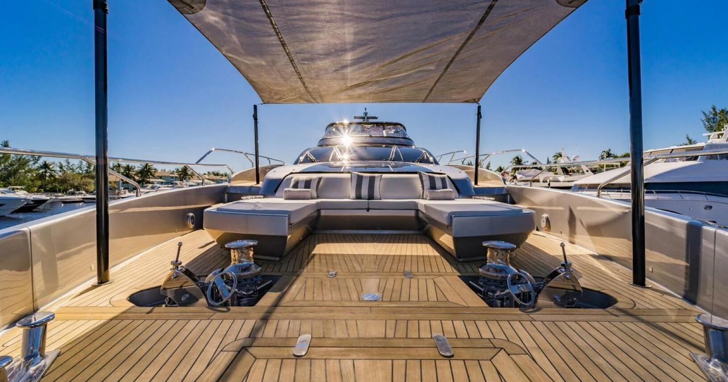 Motor yacht Beyond Beyond bow with canopy and shaded seating