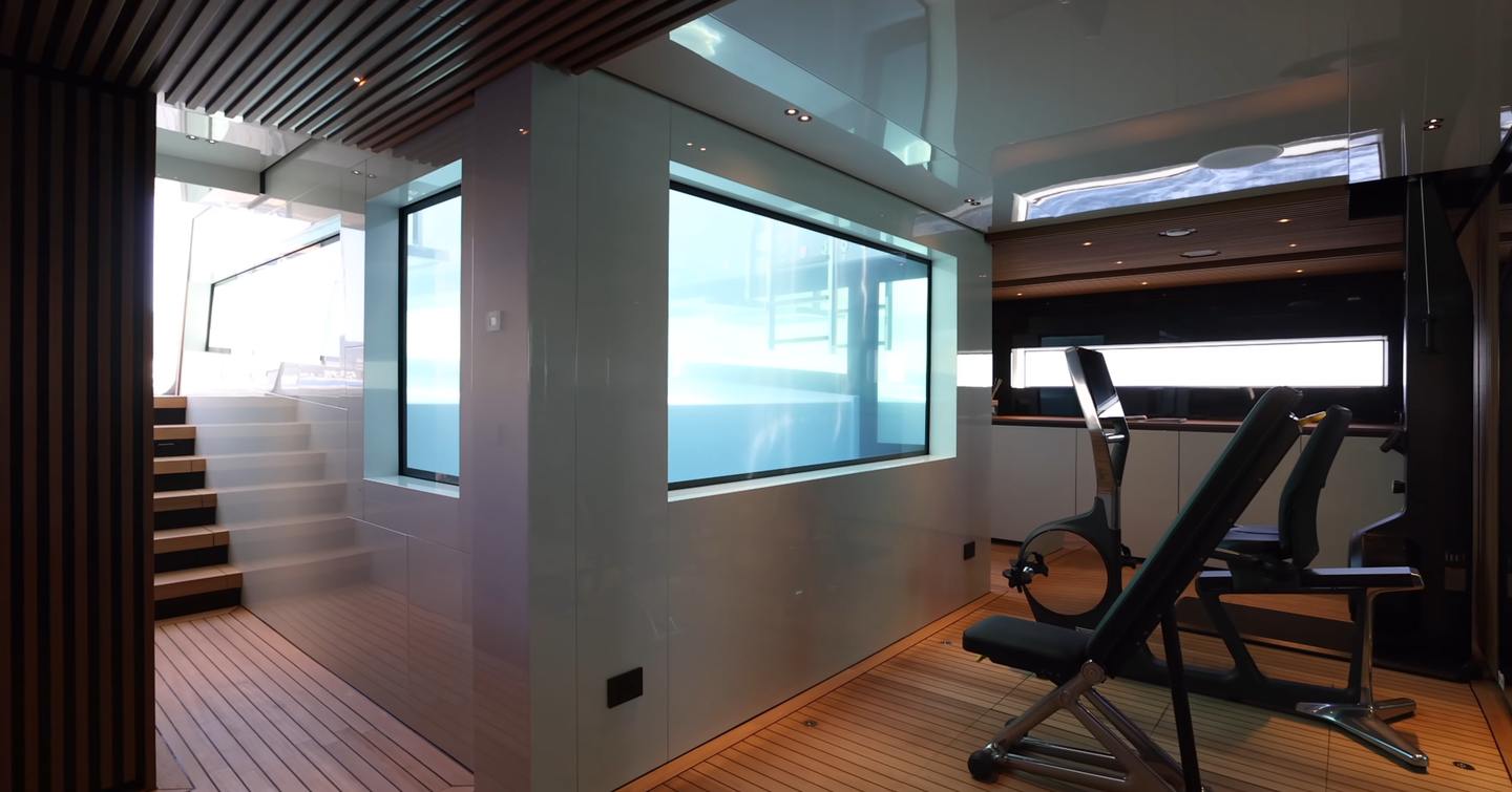 Superyacht Big Naan infinity pool walls adjacent to gym area 