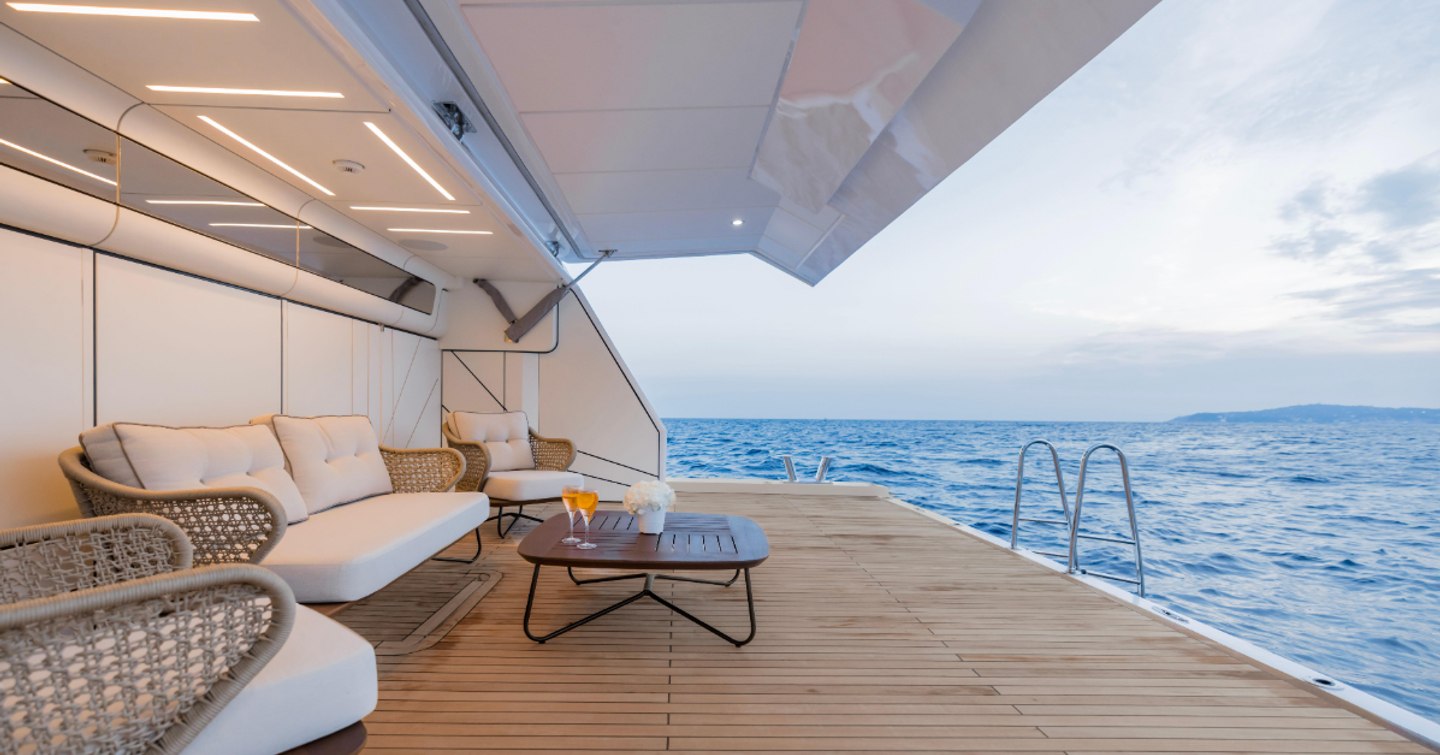 Superyacht Olivia beach club with sun loungers 