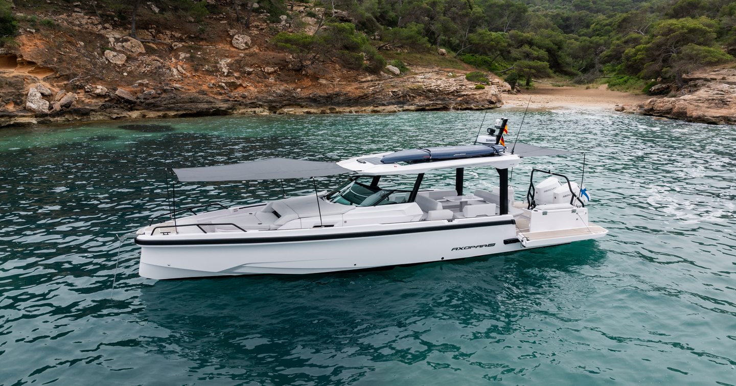 Axopar 38 Sun Top Boat at anchor with canopy on foredeck