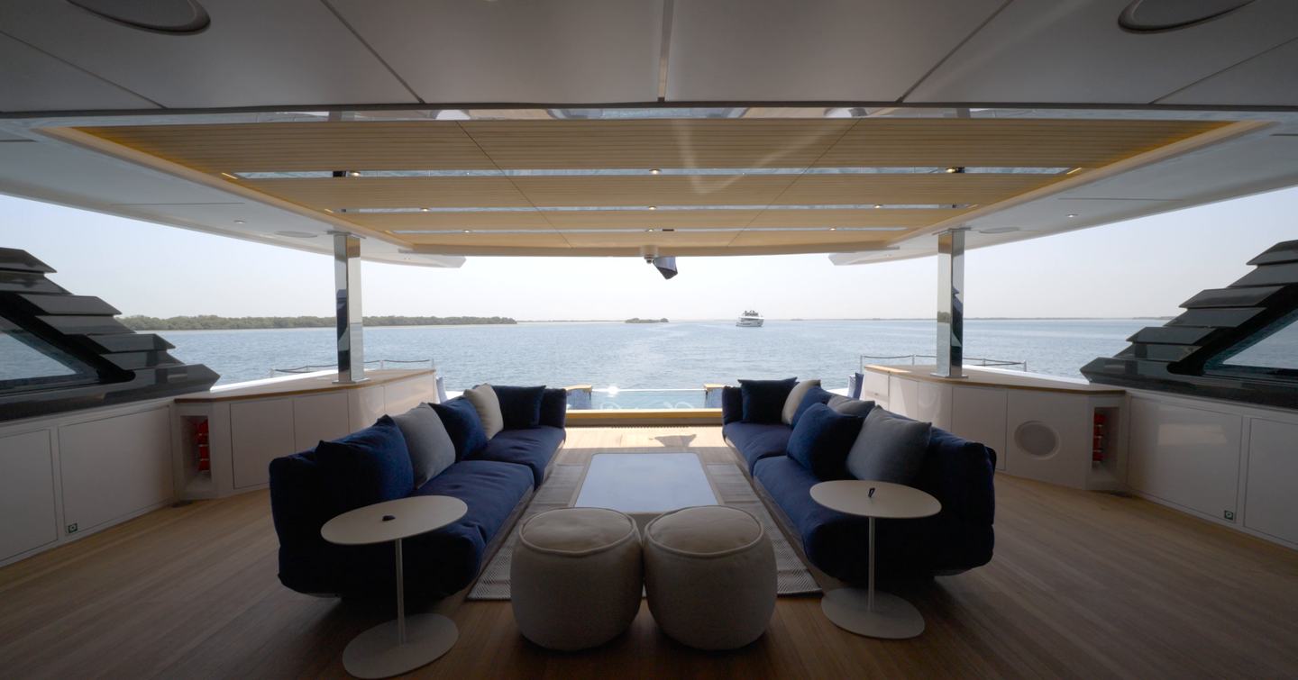 Cockpit club lounge aboard the Gulf Craft Majesty 145 overlooking the sea