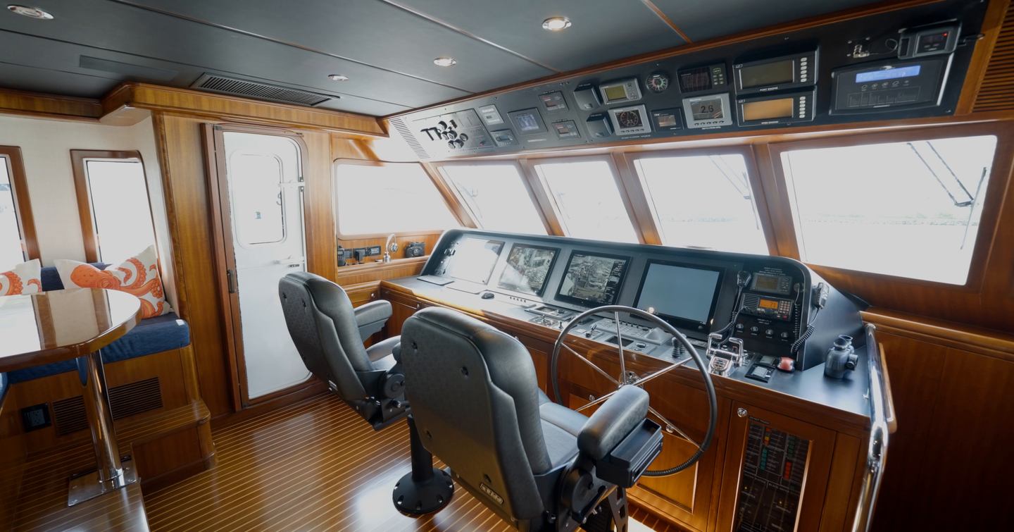 Nordhavn 75 EYF raised pilothouse with twin helm seats, navigation displays and passagemaking controls