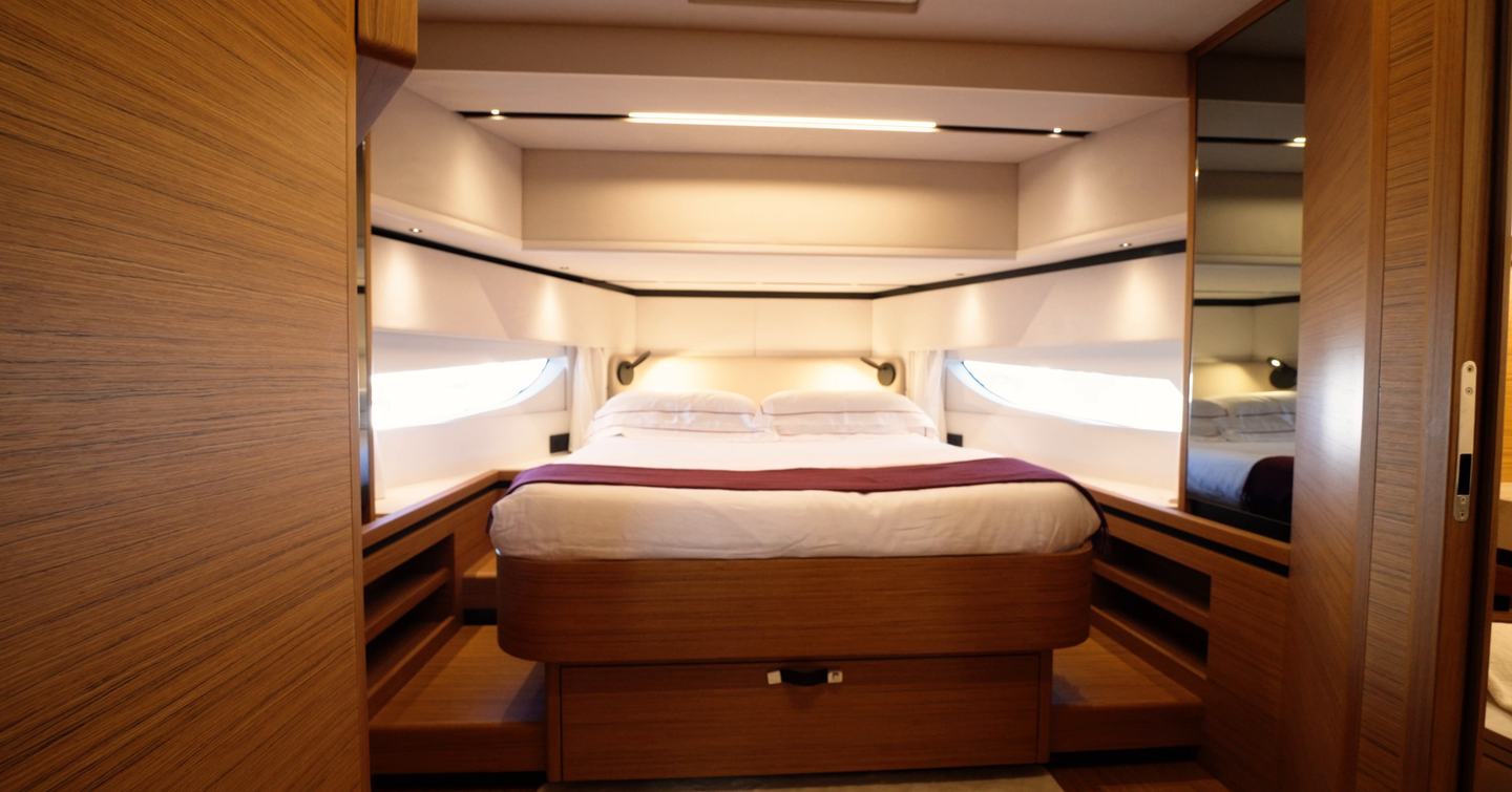 Solaris-Power-60-Coupe-Review-forward-VIP-cabin-with-central-berth-and-side-windows