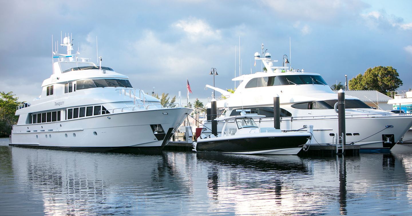 Superyachts berthed facing the camera at Port 32, Fort Lauderdale.