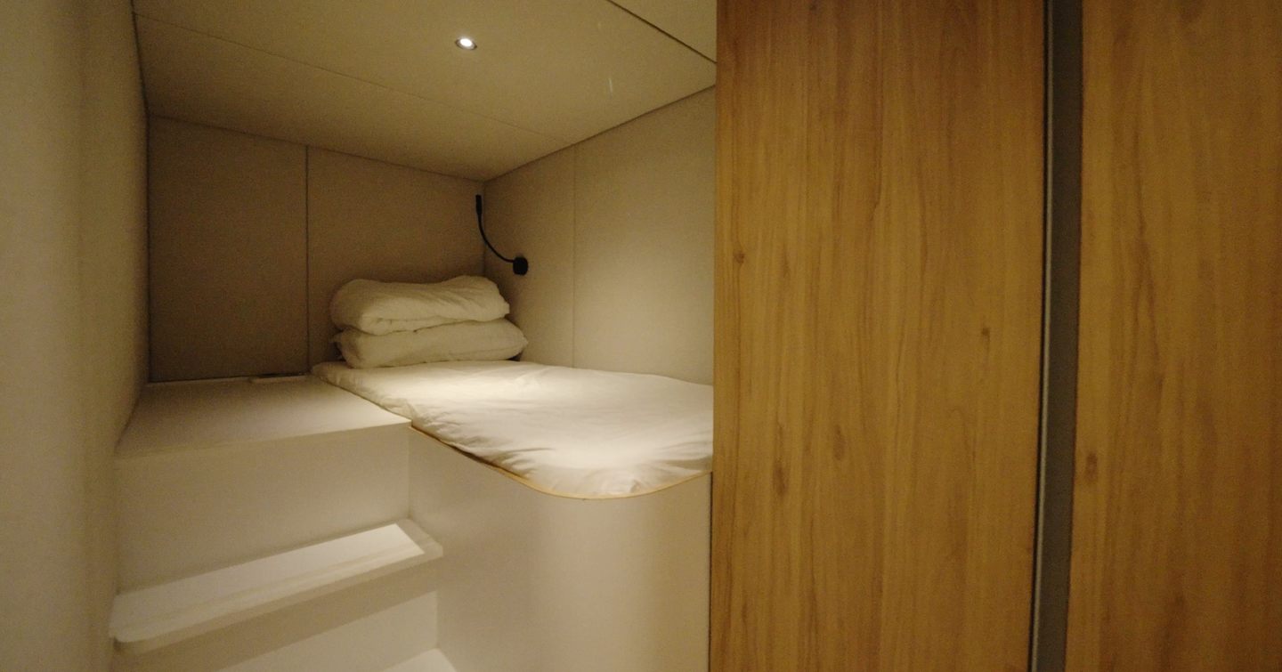 Sunreef Ultima 88 crew cabin with single berth and compact storage