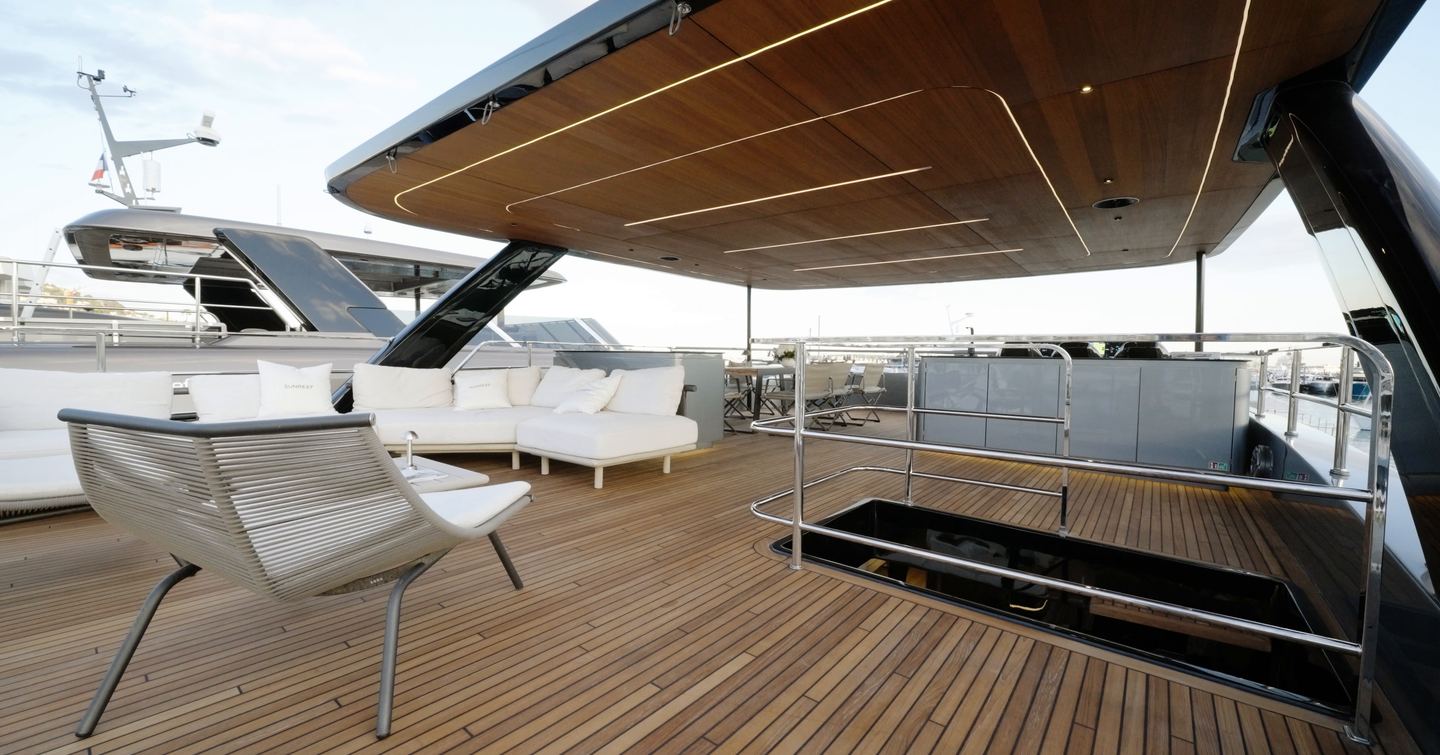 Sunreef Ultima 88 flybridge with hardtop, stair access and aft lounge seating