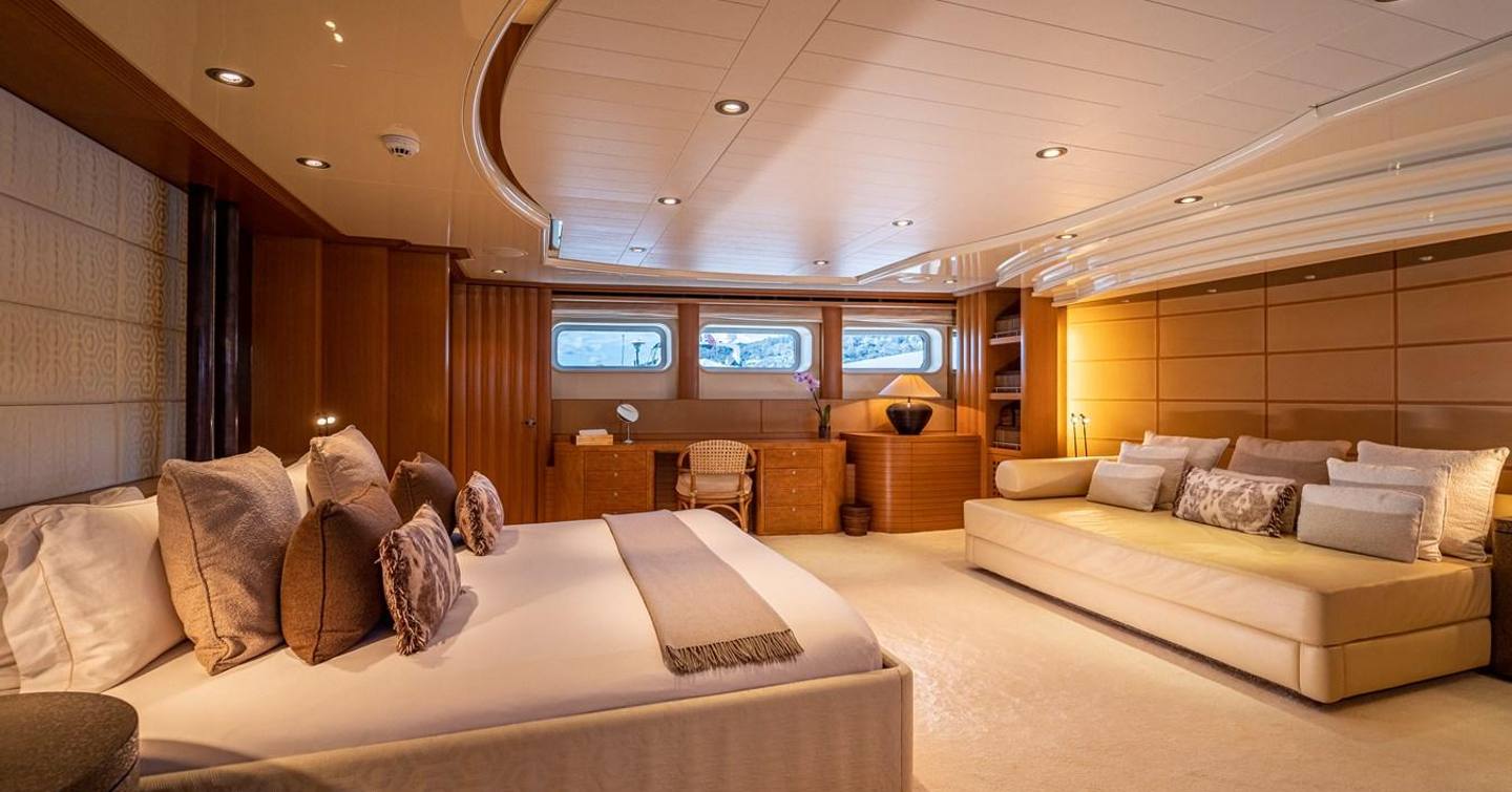 Kijo master cabin with large bed area and sofa