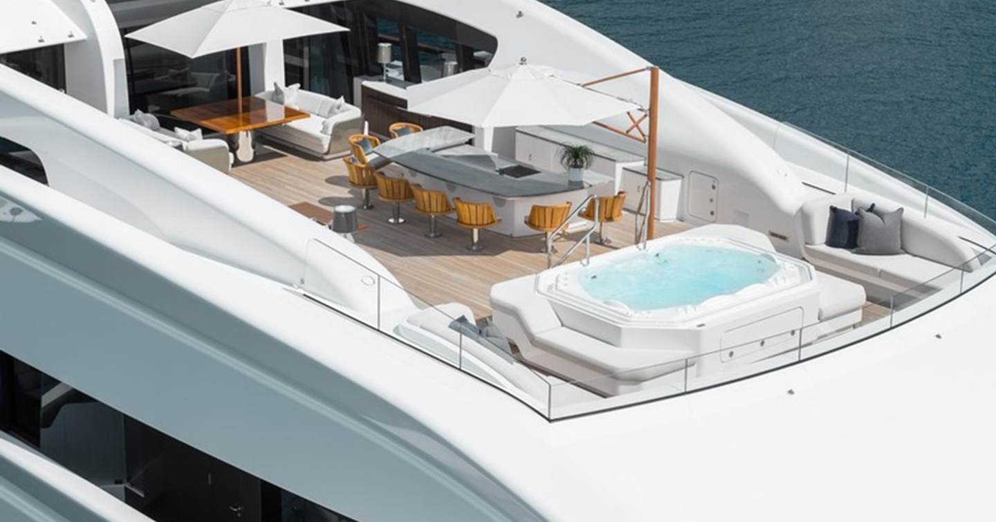 Feadship Superyacht Vanish upper deck with shaded bar area and jacuzzi 