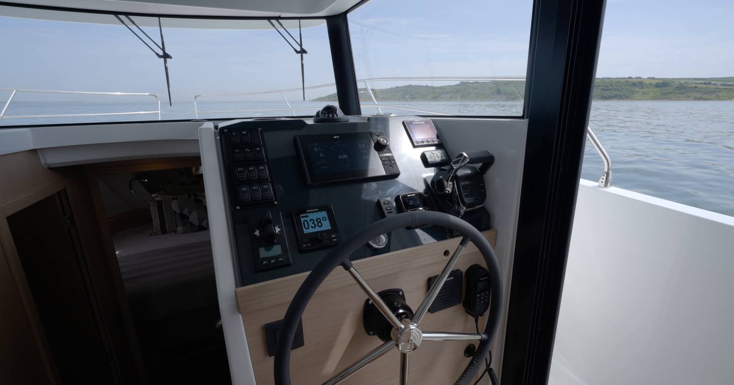 Lower helm station with side-deck access on the Beneteau Swift Trawler 37 Fly