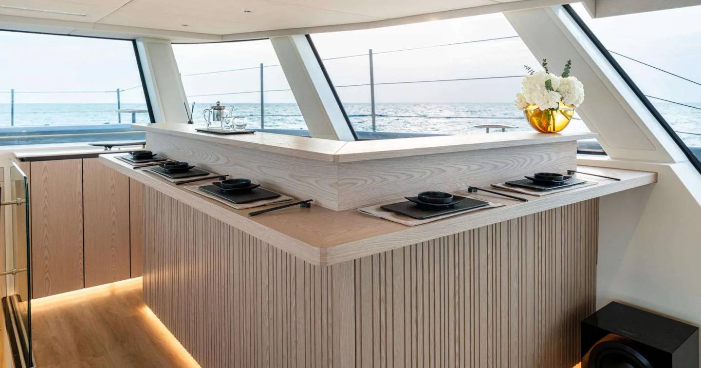 Sunreef Ultima 88 Catamaran Wasabi main saloon dining area with Omakase set up