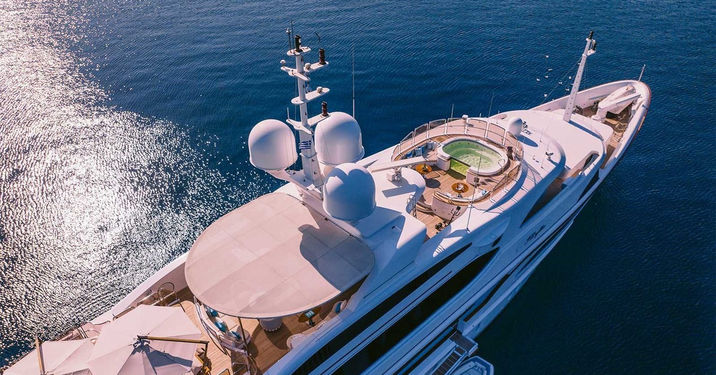 Aerial view of Superyacht IDyllic foredeck with circular jacuzzi and shaded seating 