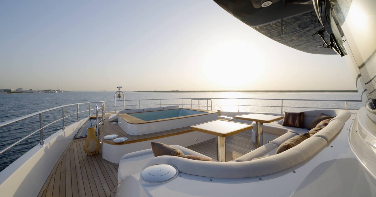 Foredeck lounge and hot tub aboard the Gulf Craft Majesty 100 Terrace