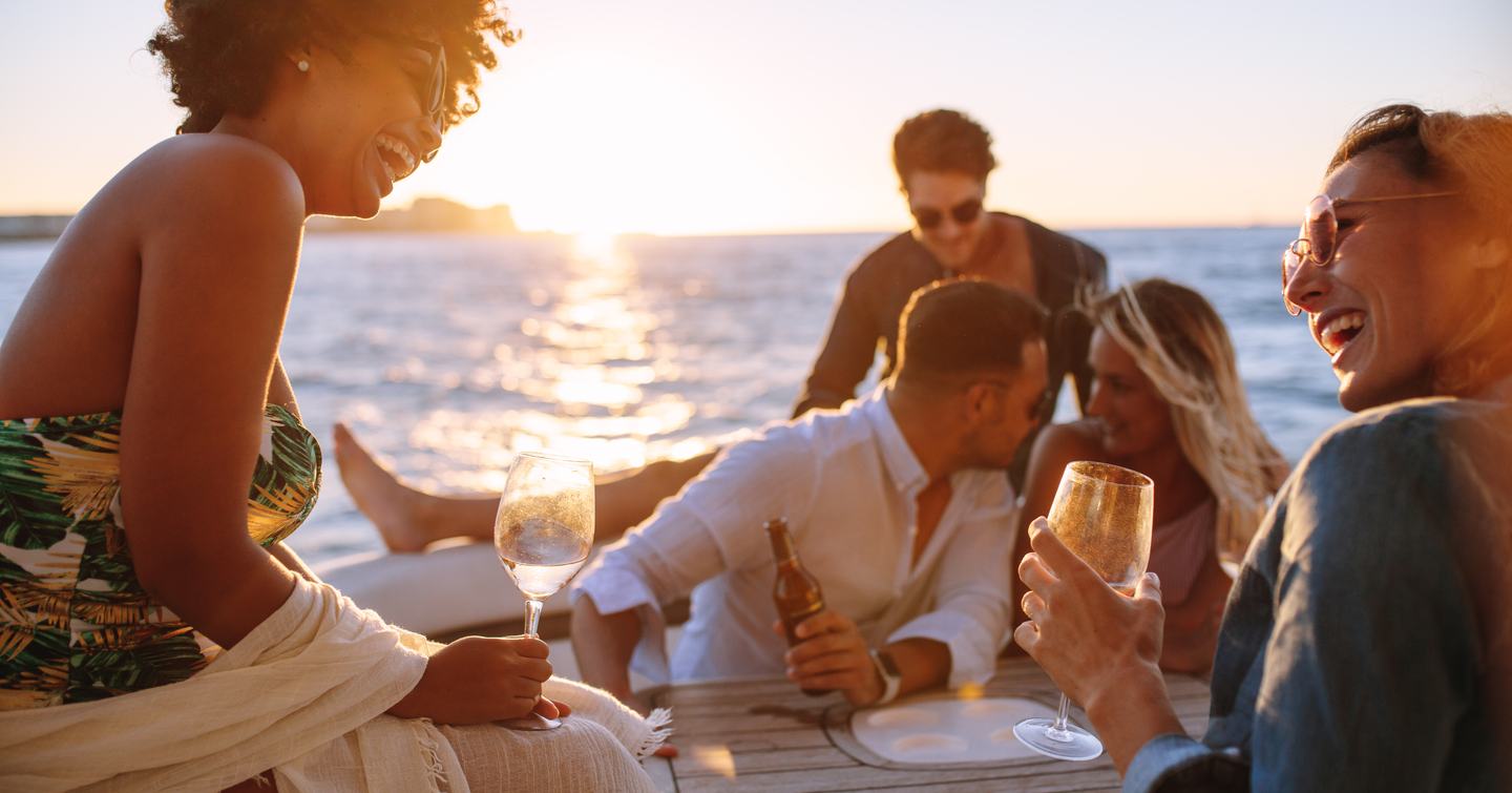 people relaxing on deck in the evening 