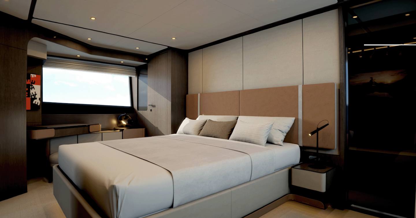 Owner's cabin on motor yacht Ferretti 800 with large bed and brown, neutral furnishings 