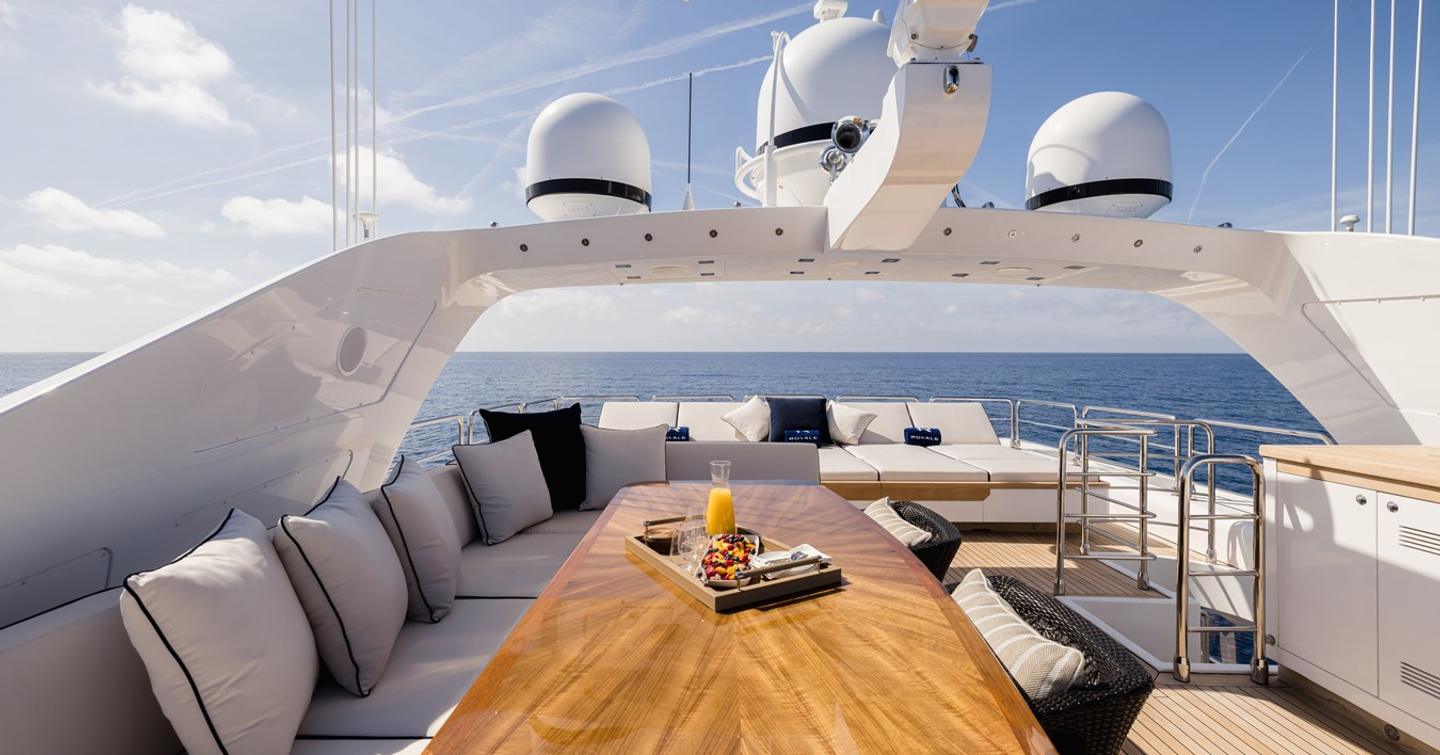 Superyacht Royale X sundeck with alfresco dining and aft sun loungers