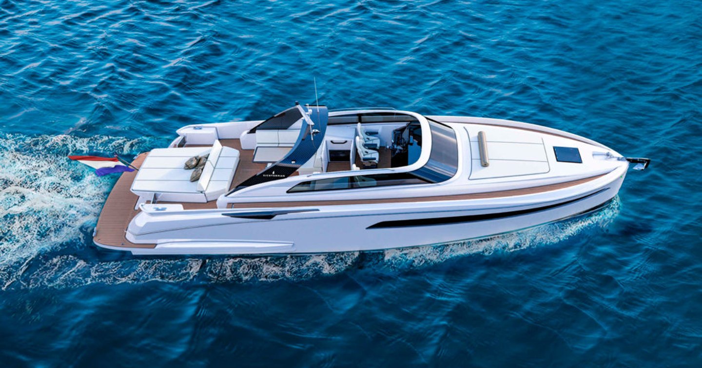 white Libertas 15m yacht with white exterior, seating and sun pads cruises through dark blue waters