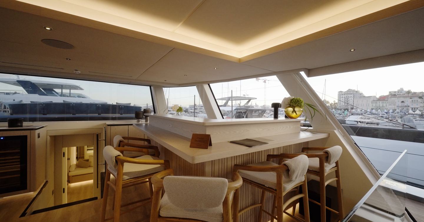 Sunreef Ultima 88 saloon with custom sushi counter and bar seating
