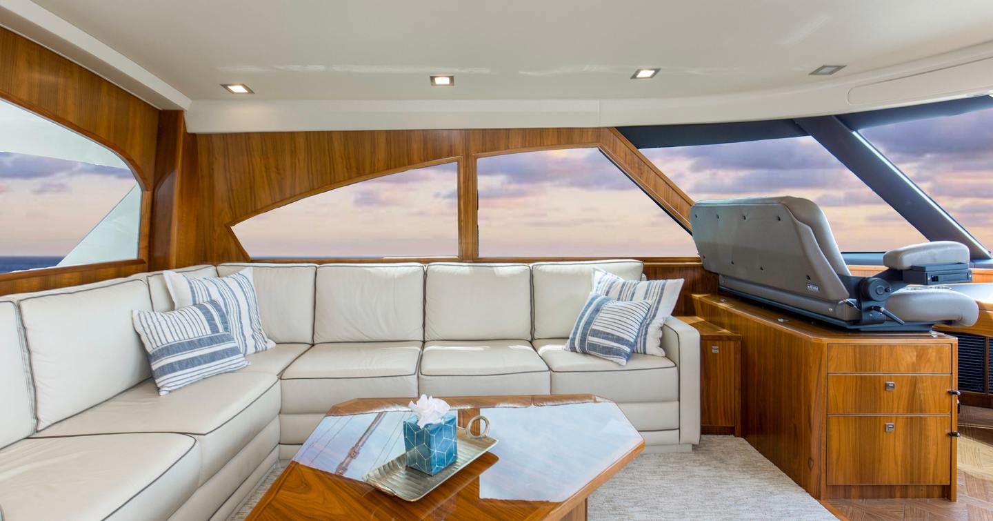 Viking 92EB Sportsfisher yacht Touche pilothouse with white L-shaped leather sofa 
