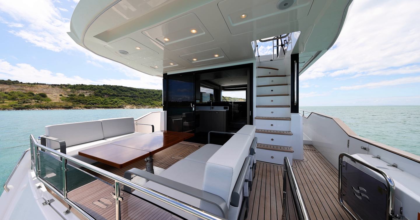 Sirena 48 aft cockpit with modular seating and flybridge staircase