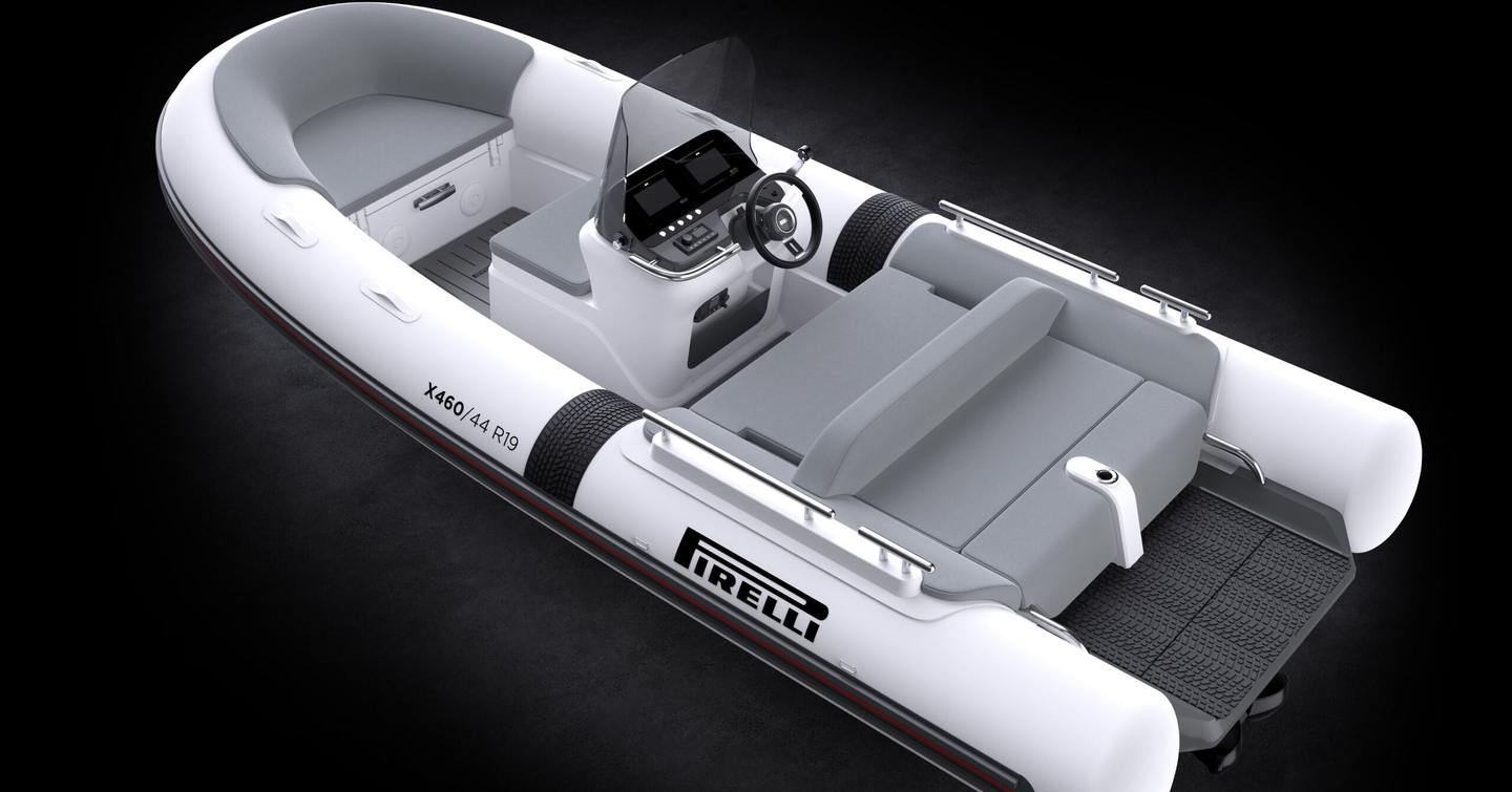 Aerial view of Tecnorib Pirelli Tender X460 with grey integrated seating against black background