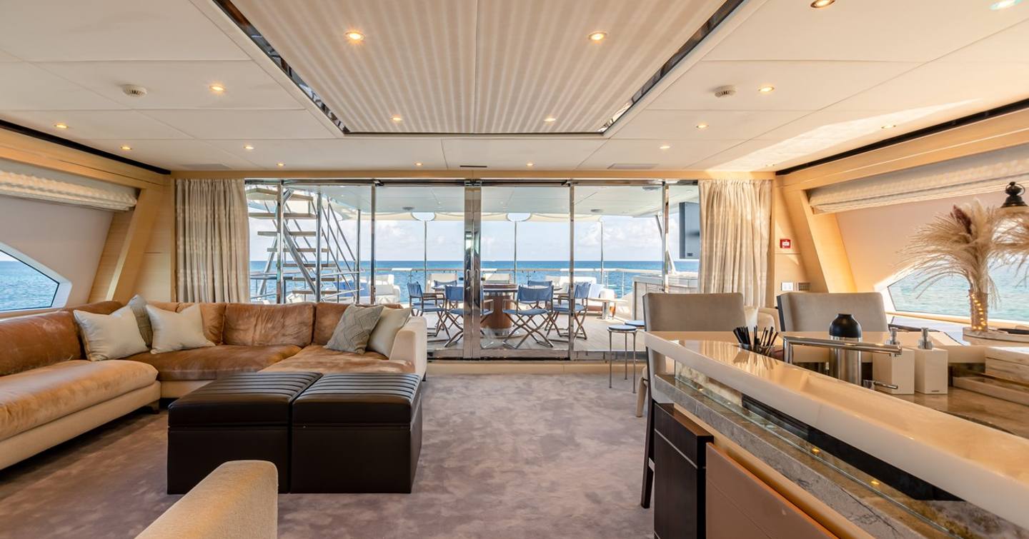 Superyacht Inspiration main saloon with seating and bar area