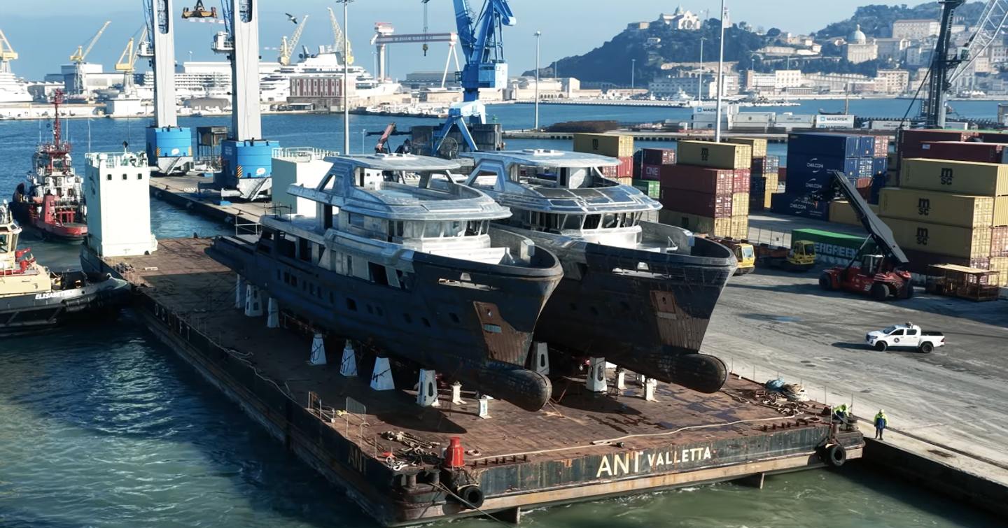 CdM Flexplorer 165 explorer yachts pre-outfitting on barge outside shipyard 