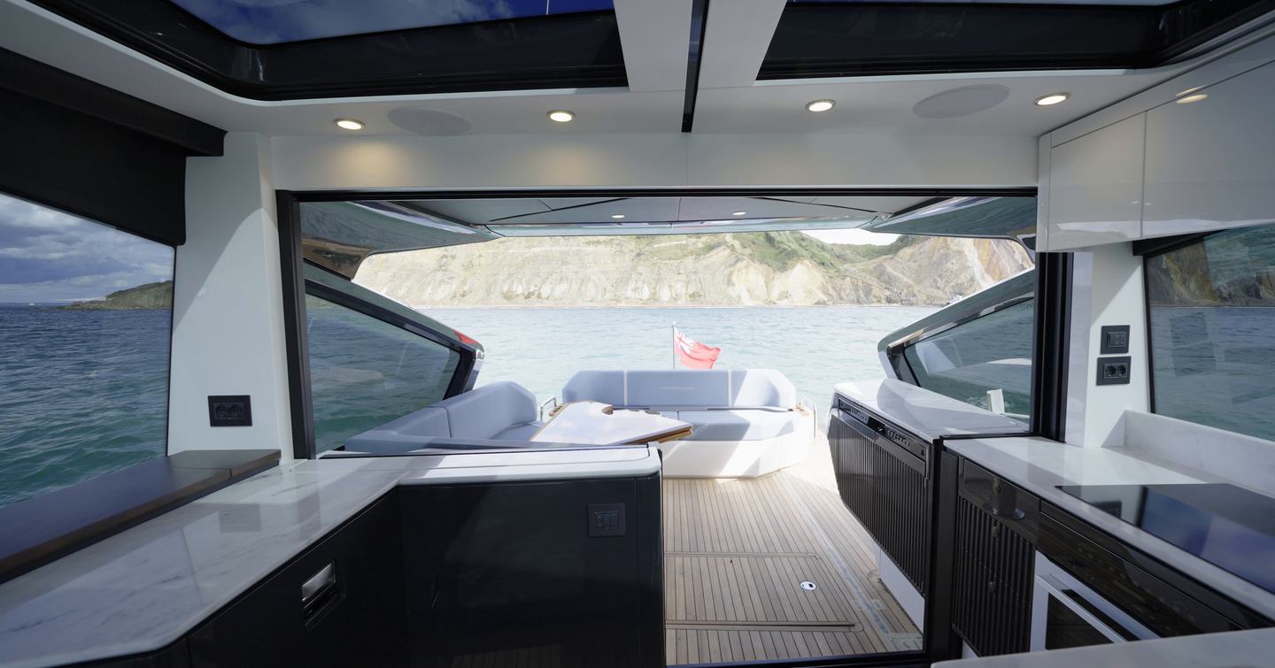 Fairline Targa 58 GTO galley looking aft through the open saloon to cockpit