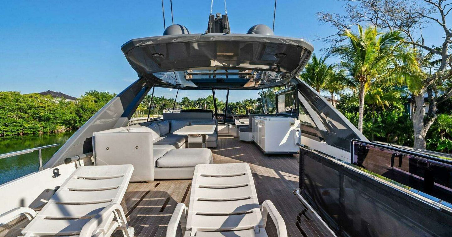 Ferretti 780 Motor Yacht Sunsation flybridge with deck chairs and shaded seating