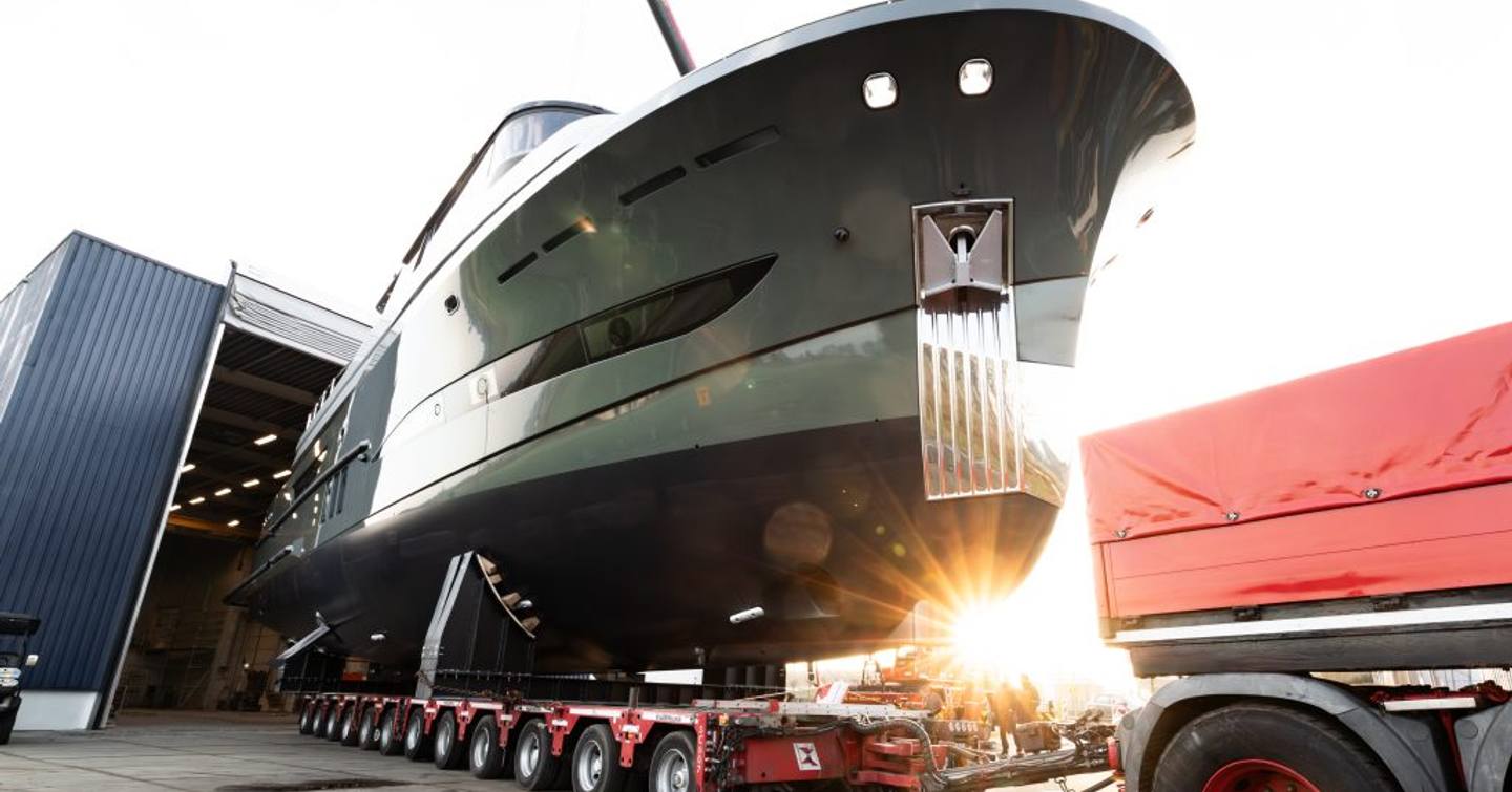 Shot of Steeler Ocean Explorer 85 motor yacht Moss under bow on trolley on way to launch