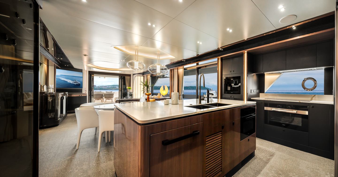 Horizon FD100 Skyline motor yacht main salon galley area with island 