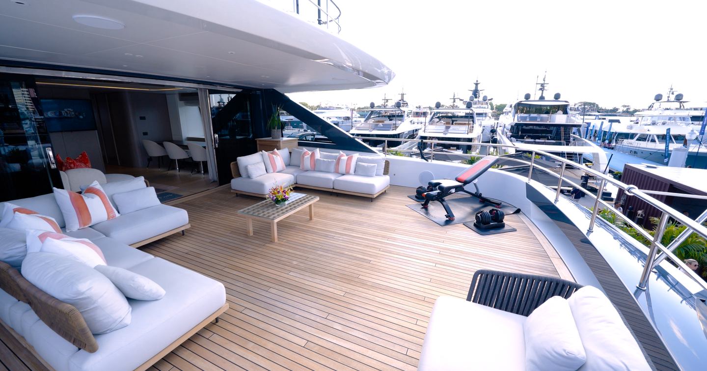 Benetti Oasis 34M bridge deck aft featuring open-air lounge seating, expansive entertaining space and direct connection to the upper saloon.