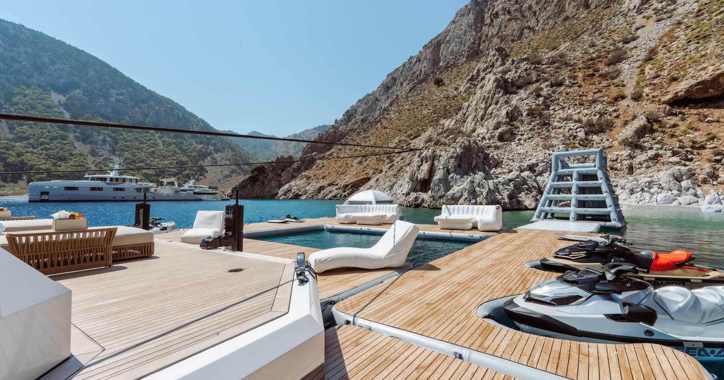 Damen Xplorer 60 expedition yacht extended aft with tenders and sun loungers 