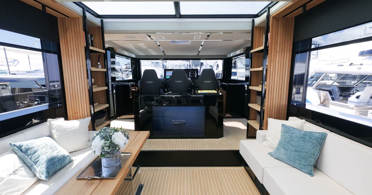 De Antonio D60 saloon with panoramic glazing, opening roof and open-plan connection to helm station