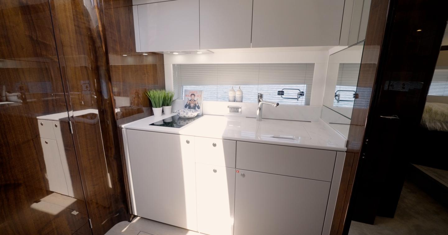 Lower deck galley on the Fairline Targa 47 GT with induction hob and Corian worktop