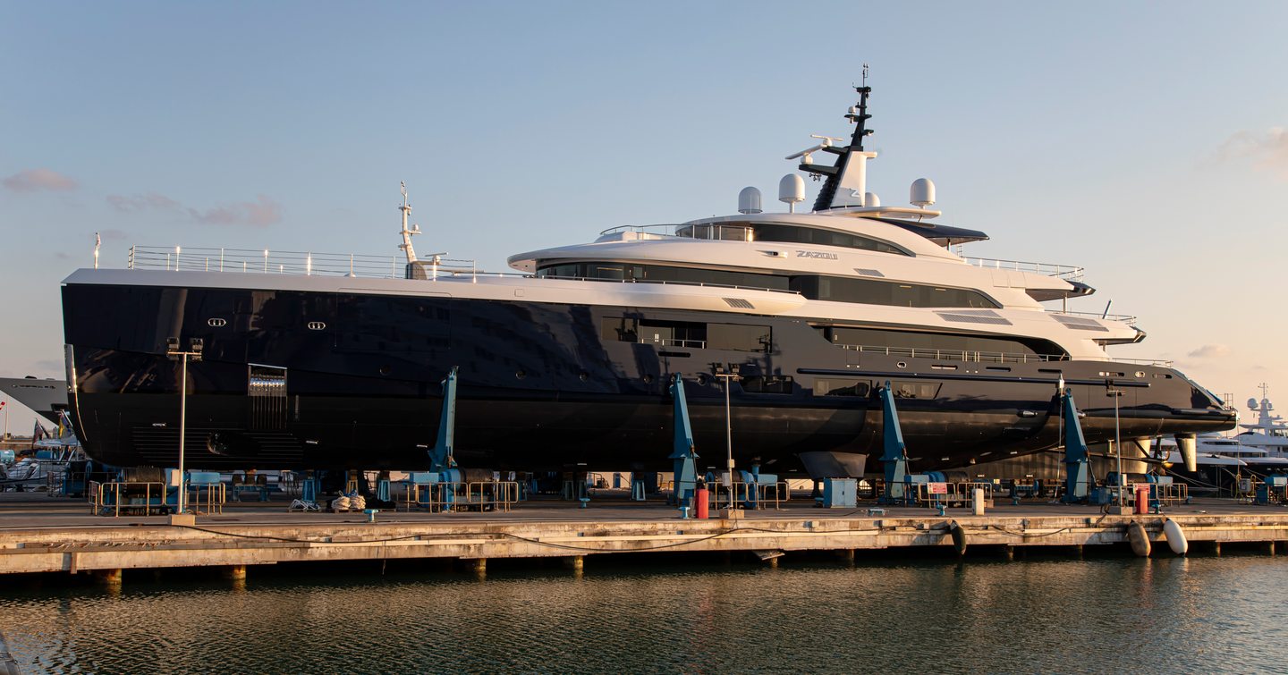 Side view of superyacht ZAZOU docked.