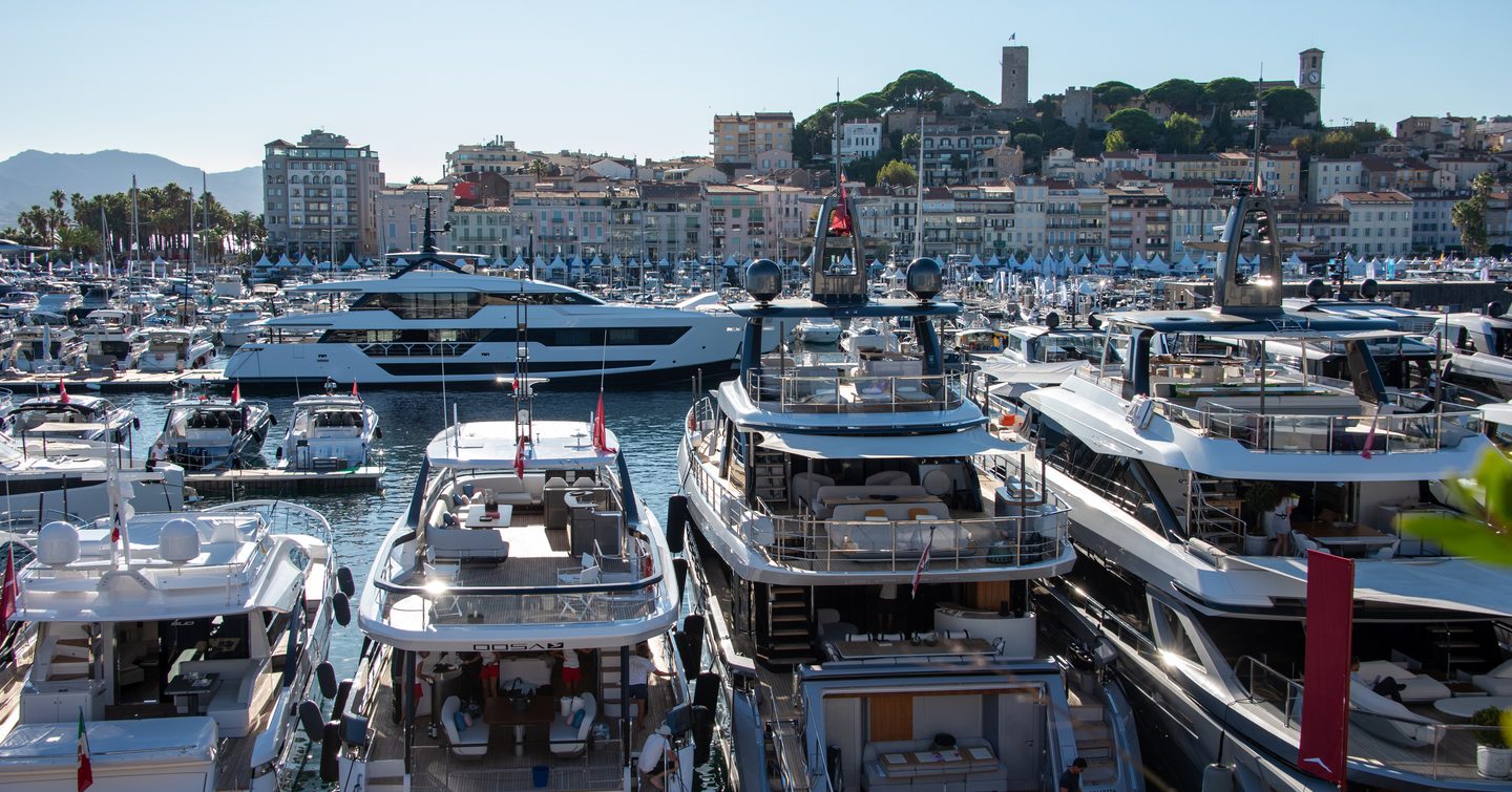 Cannes Yachting Festival 2024 view over superyachts to the show and the town of Cannes on a bright day