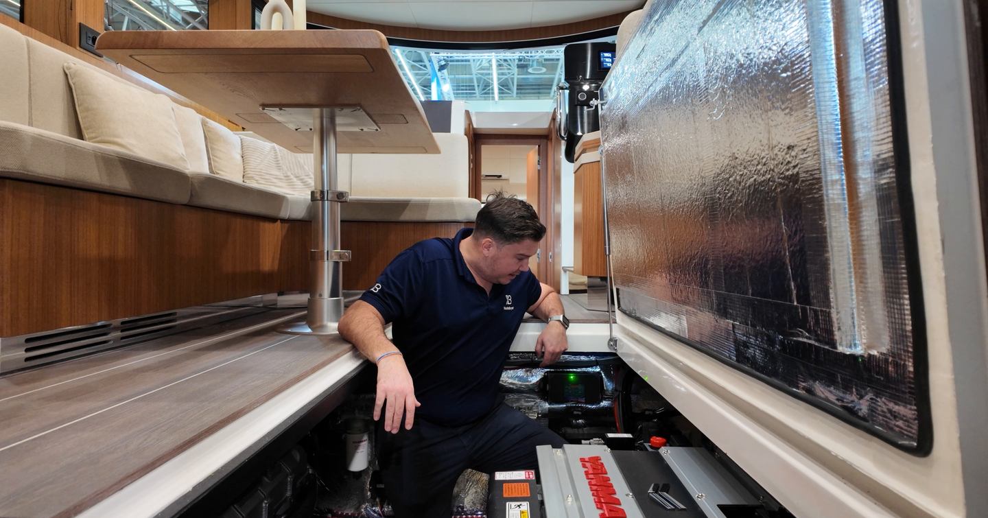 Greenline 42 engine room access through saloon hatch showing Yanmar diesel installation