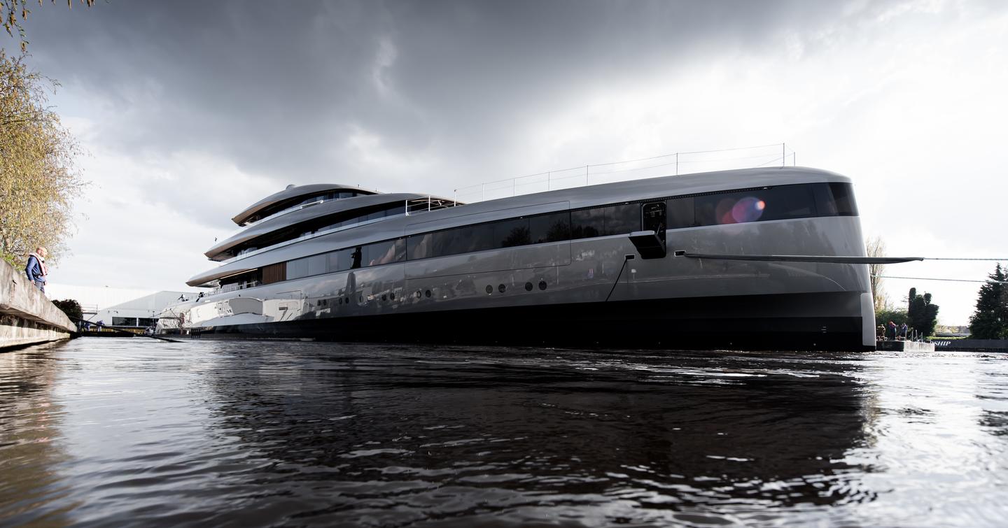 Overview of Feadship Project 710 just after emerging from shed in Aalsmeer. Surorunded by construction facilities.