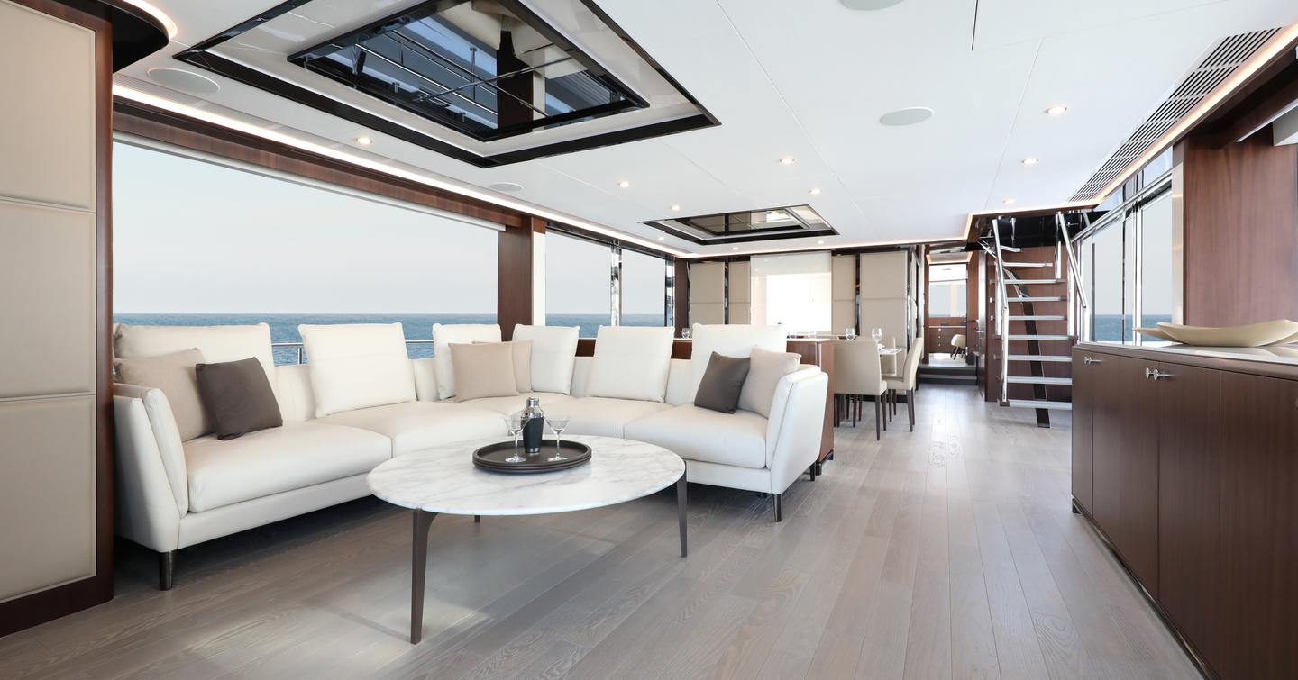 Ocean Alexander 32L motor yacht main saloon with white L-shaped sofa 