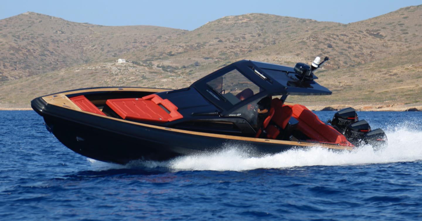 The Omega 47 carving at sea