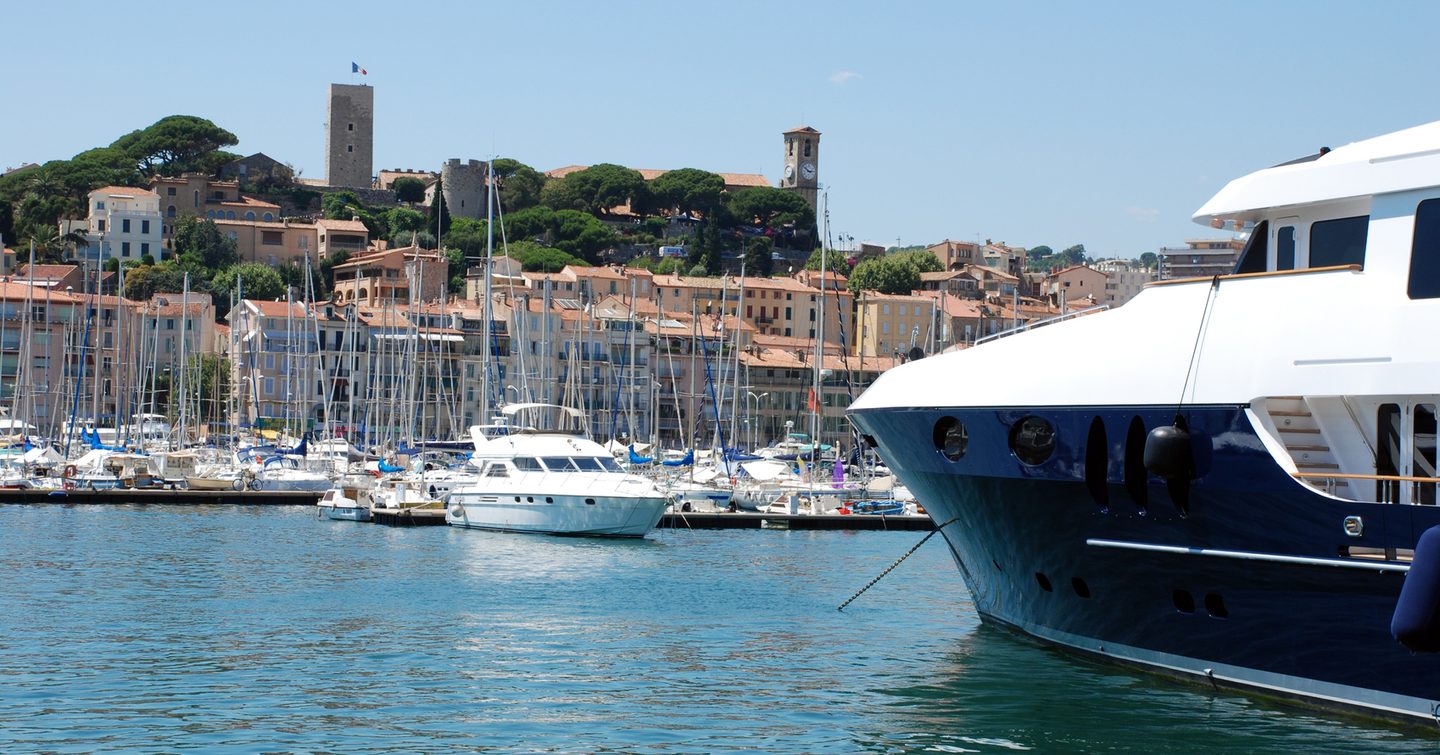 Yacht going to port at a marina 