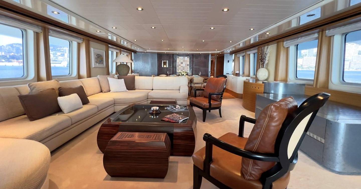 Kijo main saloon with white sofa area and dining space